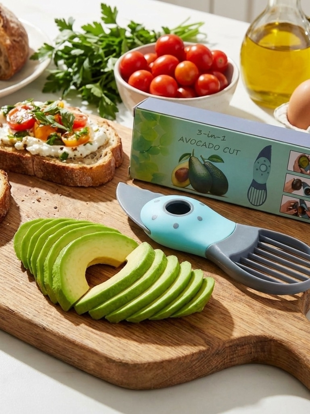 Universal Standard 3-in-1 Avocado Cutter in Light Blue and Gray